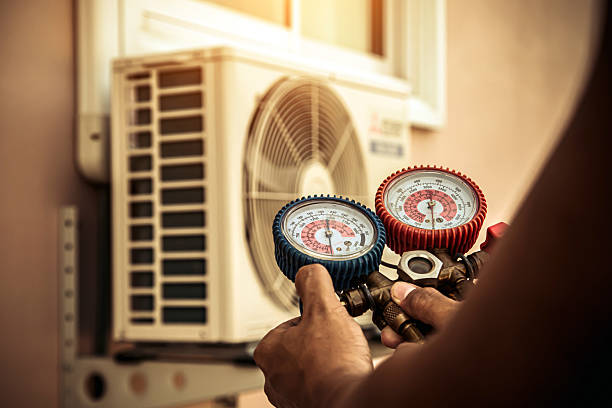 Professional Air Conditioning Service technician working in Ashland, AL